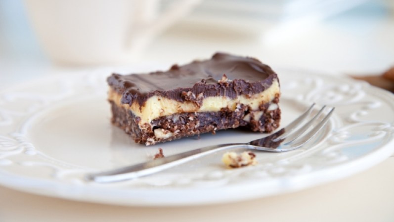 Nanaimo (Canadá) Una barra de chocolate sin hornear rellena de una crema con sabor a vainilla. Una delicia proveniente de la Bahía de Nanaimo y que se ha convertido en el postre nacional de Canadá.