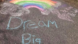 Photos of chalk messages on driveways