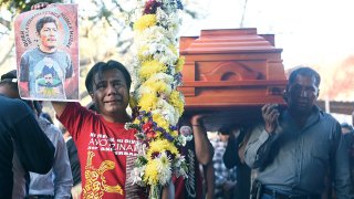 Funeral de uno de los activistas asesinados en México.