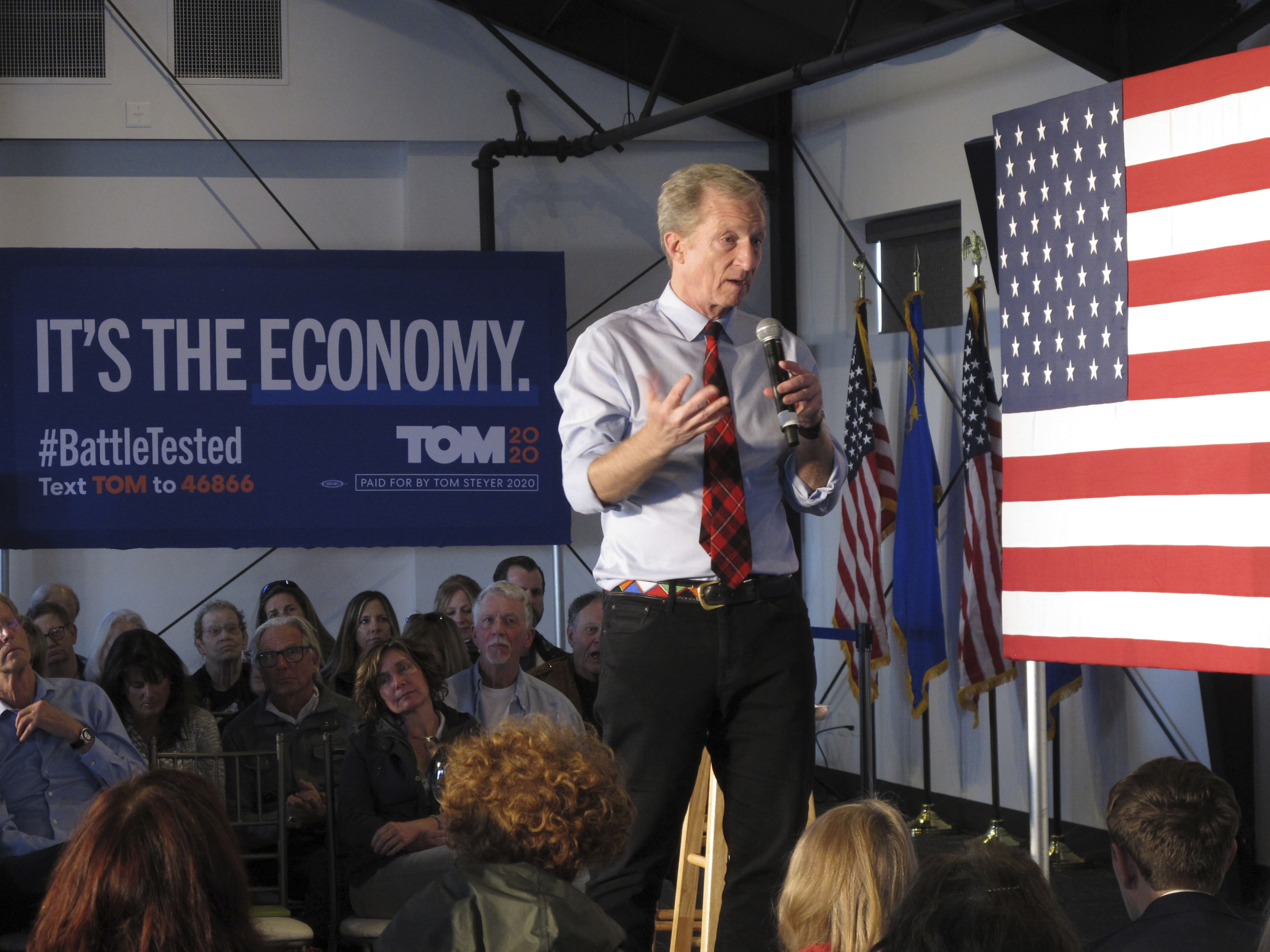 Democratic presidential hopeful Tom Steyer speaks at a rally in west Reno, Nev., Wednesday, Feb. 12, 2020, before his three-day bus tour through Nevada heads to Las Vegas on Thursday. The California billionaire says he’s poised to "shock the world" in Nevada’s Feb. 22 caucuses, then carry the momentum into South Carolina’s primary the following week in what he says is still a "wide open" race for his party’s nomination.