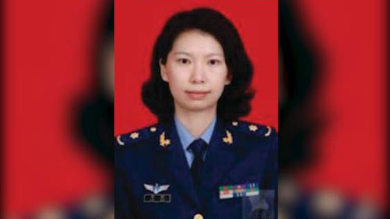 This undated photo provided by the U.S. Justice Department shows Juan Tang in her China People's Liberation Army military uniform.