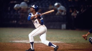 Hank Aaron Swings at a pitch