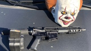 Firearm and clown mask uncovered during a traffic stop in San Leandro.