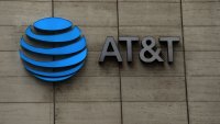 The logo of AT&T outside of AT&T corporate headquarters on March 13, 2020 in Dallas, Texas.