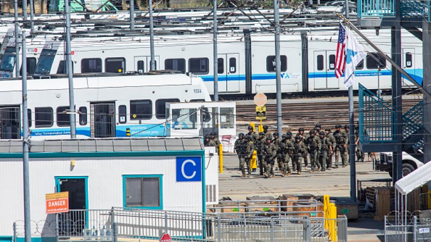 SAN JOSE, CA – MAY 26: Tactical law enforcement officers move through the Valley Transportation Authority (VTA) light-rail yard where a mass shooting occurred on May 26, 2021 in San Jose, California. A VTA employee opened fire at the yard, with preliminary reports indicating nine people dead including the gunman. (Photo by Philip Pacheco/Getty Images)