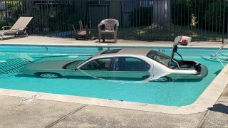 A car ends up in a pool in San Jose following a crash.