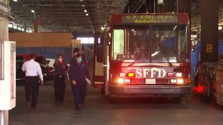 First responders in San Francisco work at the scene of a coronavirus-related incident.