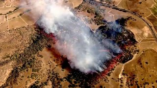 A brush fire burns near Schellville in Sonoma County.