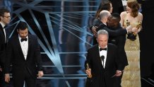 HOLLYWOOD, CA - FEBRUARY 26:  Actor Warren Beatty (R) announces the actual Best Picture winner as 'Moonlight,' not 'La La Land,' after a presentation error onstage during the 89th Annual Academy Awards at Hollywood & Highland Center on February 26, 2017 in Hollywood, California.  (Photo by Kevin Winter/Getty Images)