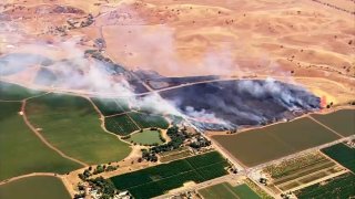 A brush fire burns in eastern Contra Costa County.