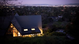 A homes stands at dusk in Los Altos Hills.