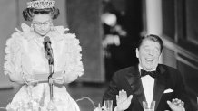 President Reagan laughs following a joke by Queen Elizabeth II, who commented on the lousy California weather she has experienced since her arrival to the States. The British Queen is delivering a brief address during a state dinner held at the De Young Museum in San Francisco. (Photo by Bettmann/Getty Images)