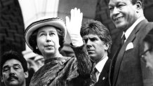 Feb. 28, 1983: Queen Elizabeth II waves to crowd while escorted into Los Angeles City Hall by Mayor Tom Bradley. This photo was published in the Mar. 1, 1983 (Photo by Fitzgerald Whitney/Los Angeles Times via Getty Images)