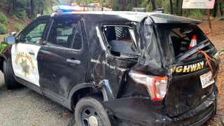 Damage to a California Highway Patrol vehicle following a crash on Highway 17 in the Santa Cruz Mountains.