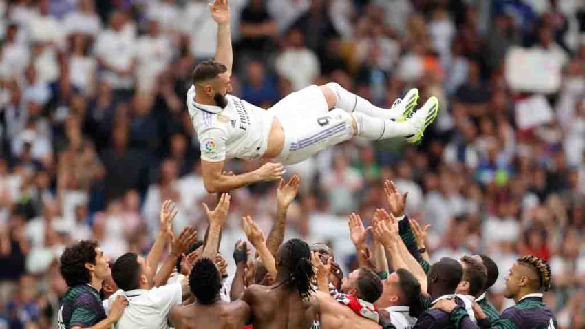 MADRID, SPAIN – JUNE 04: Karim Benzema of Real Madrid is thrown in the air by teammates following the LaLiga Santander match between Real Madrid CF and Athletic Club at Estadio Santiago Bernabeu on June 04, 2023 in Madrid, Spain. (Photo by Florencia Tan Jun/Getty Images)