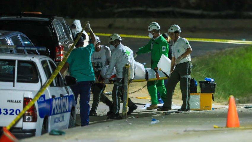 SAN SALVADOR, EL SALVADOR – MAY 20: Members of the Institute of Legal Medicine of El Salvador raise the bodies of deceased fans of Alianza F.C. at the Cuscatlan stadium, in San Salvador, El Salvador, on May 20, 2023. At least twelve people were killed and dozens more injured when stampeding fans of said club pushed through one of the access gates at a Salvadoran league quarterfinal soccer match between Alianza F.C. and C.D. FAS. (Photo by Alex Pena/Anadolu Agency via Getty Images)