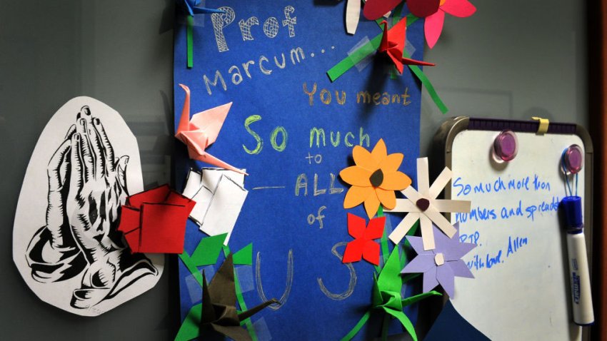 Washington, DC  October 26, 2010  mementos and notes of affection and loss are posted on the office door of American University Business Professor Sue Ann Marcum who was killed during an apparent home invasion in her Bethesda, MD home on October 26, 2010.  (Photo by Gerald Martineau for The Washington Post via Getty Images)