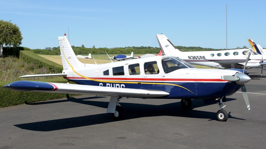 Turweston Aerodrome, Buckinghamshire/ United Kingdom – 25 May 2020 : A Piper PA-32-300 Lance light aircraft on the ramp at an airfield