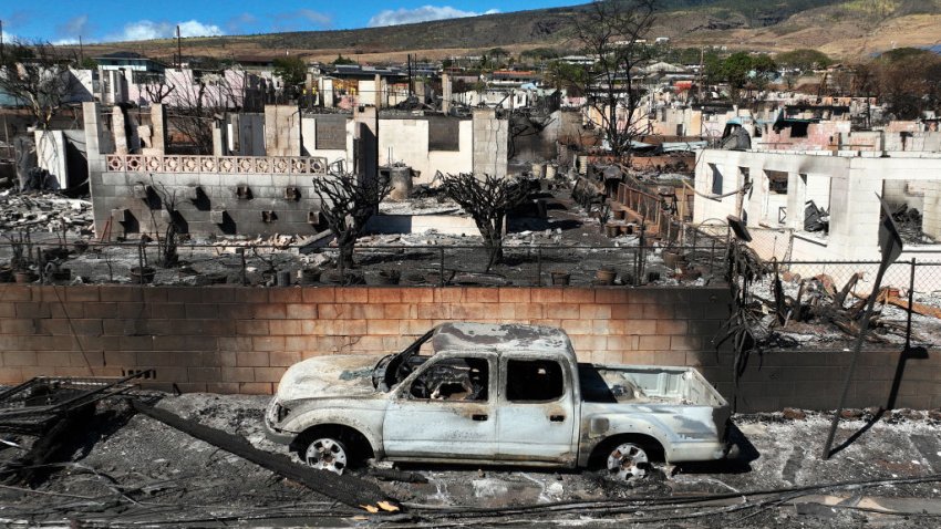 LAHAINA, HAWAII – AUGUST 17: In an aerial view, burned cars and homes are seen a neighborhood that was destroyed by a wildfire on August 17, 2023 in Lahaina, Hawaii. At least 111 people were killed and thousands were displaced after a wind driven wildfire devastated the towns of Lahaina and Kula early last week. Crews are continuing to search for missing people. (Photo by Justin Sullivan/Getty Images)