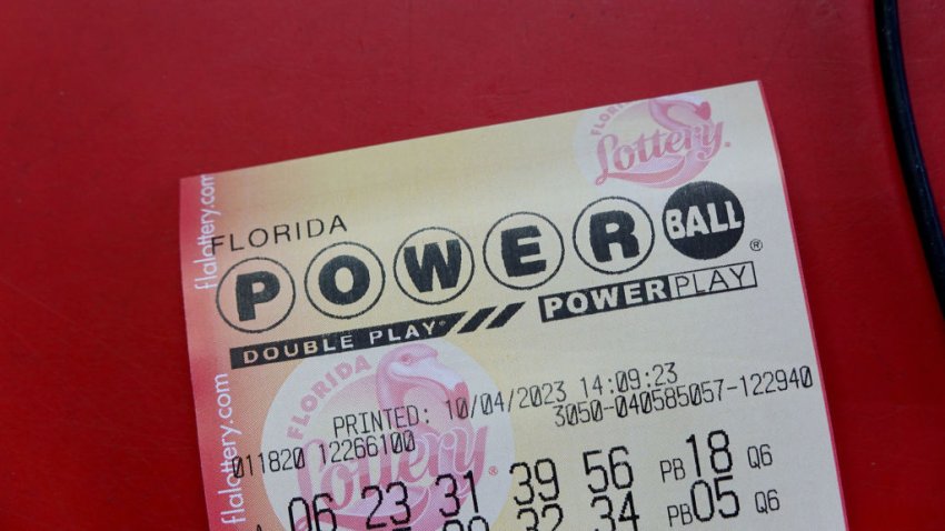 MIAMI, FLORIDA – OCTOBER 04: A Powerball ticket is seen on a counter after being purchased in a store on October 04, 2023 in Miami, Florida. Wednesday’s Powerball drawing will be an approximately $1.2 billion jackpot.  (Photo by Joe Raedle/Getty Images)