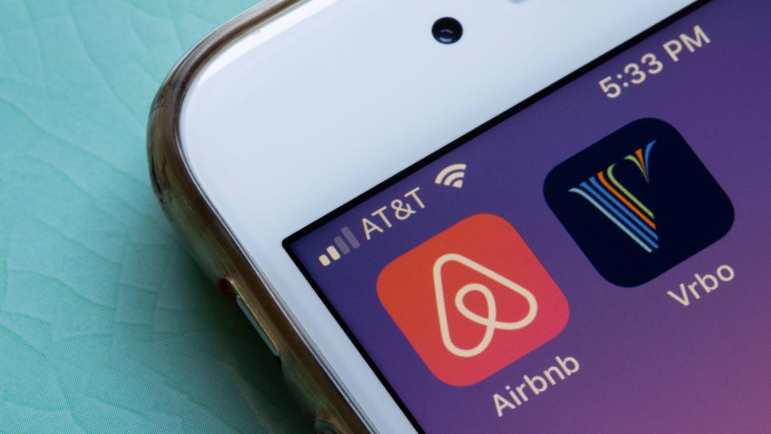 Portland, OR, USA – Aug 4, 2021: Airbnb and Vrbo mobile app icons are seen on an iPhone. Competitors in online vacation rental business concept.