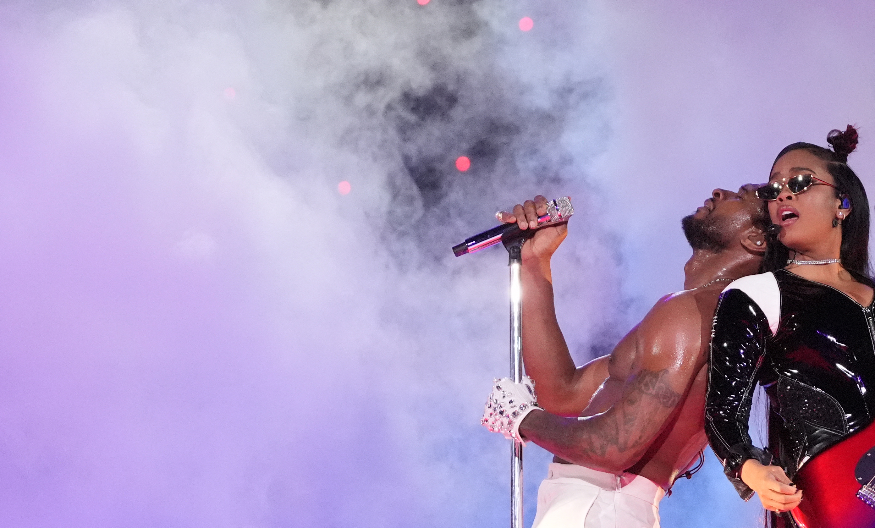 Usher and H.E.R. perform during the halftime show of Super Bowl LVIII in Las Vegas, Nevada, Feb. 11, 2024.