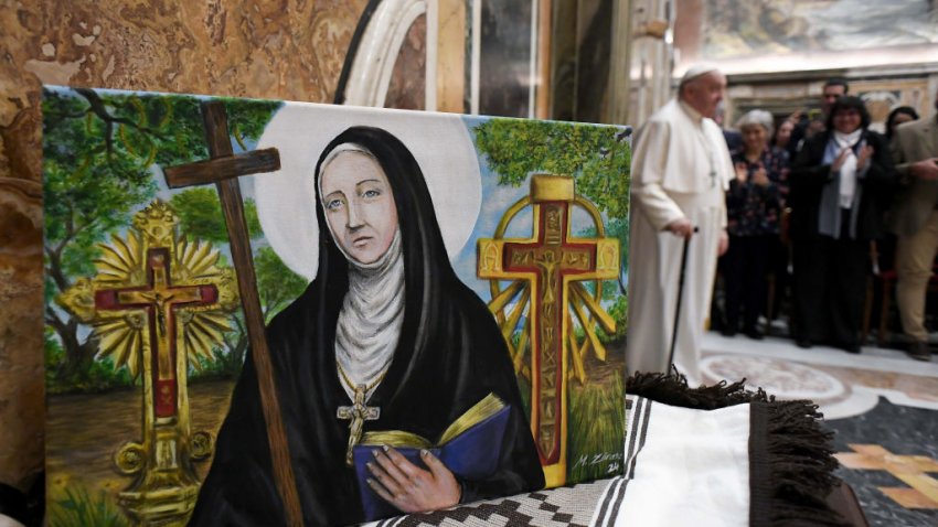 VATICAN CITY, VATICAN – FEBRUARY 09: (EDITOR NOTE: STRICTLY EDITORIAL USE ONLY – NO MERCHANDISING). A painting featuring sister Virgin Mary in Lourdes is seen at the Apostolic Palace as Pope Francis meets with pilgrims from Argentina who are in Rome for the canonisation of Blessed Maria Antonia of Saint Joseph de Paz y Figueroa on February 09, 2024 in Vatican City, Vatican. Known as Mama Antula, the Argentine-born nun founded the House for Spiritual Exercises of Buenos Aires and is the first female Argentinian Saint. Pope Francis chose the date of her canonisation for 11 February 2024, the anniversary of the first apparition of the Blessed Virgin Mary in Lourdes. (Photo by Vatican Media via Vatican Pool/Getty Images)