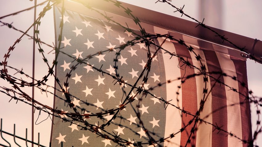 American flag and barbed wire, USA border