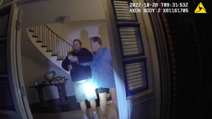 Video from the San Francisco Police Department shows the husband of former U.S. House Speaker Nancy Pelosi, Paul Pelosi, right, and David DePape during a brutal attack in the couple’s San Francisco home, Oct. 28, 2022.