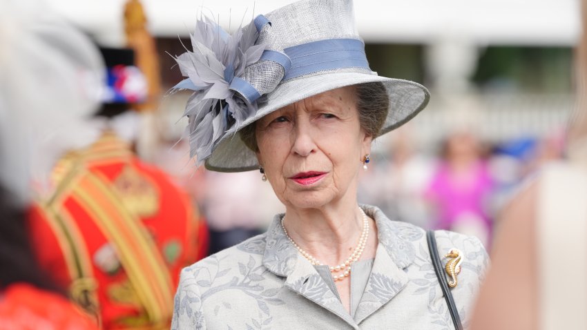 Princess Anne meets guests during the Sovereign's Royal National Lifeboat Institution garden party at Buckingham Palace on May 23, 2024 in London, England.