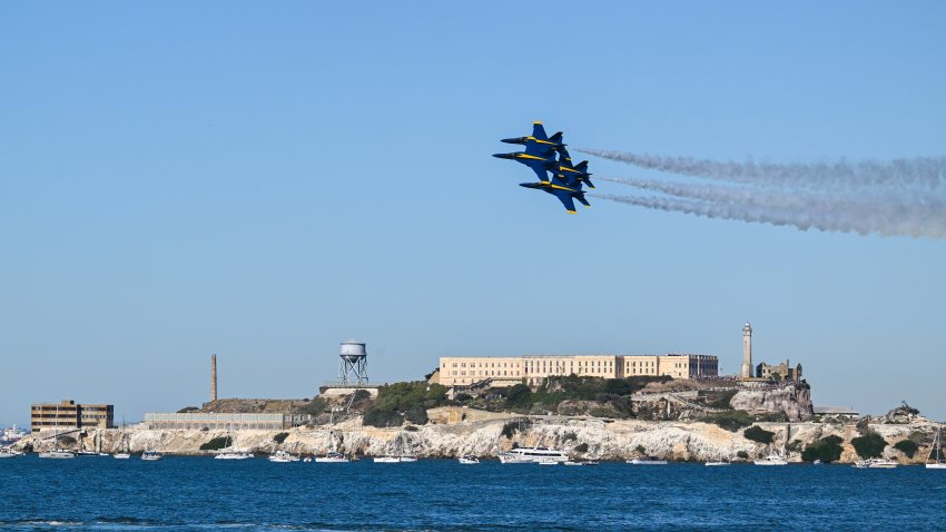 Blue Angels planes fly near Alcatraz Island.