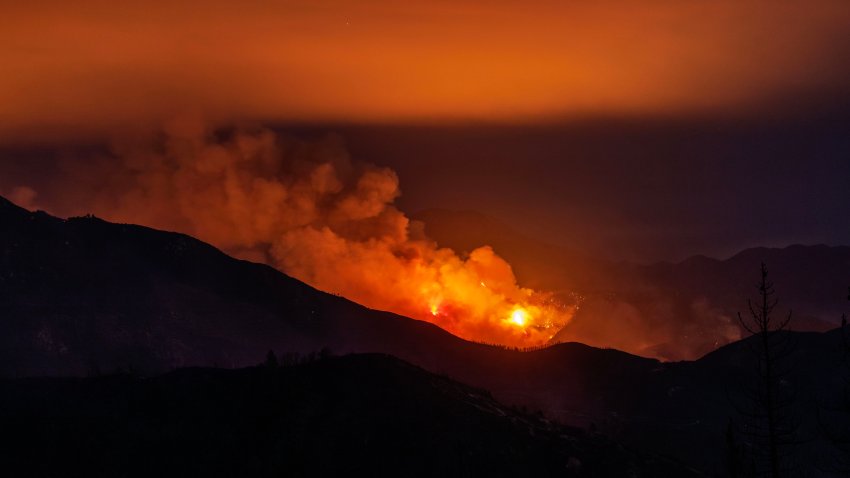 SAN BERNARDINO NATIONAL FOREST, CA – SEPTEMBER 10, 2024: The Line fire continues to burn in the evening just south Running Springs as seen from Highway 330 on September 10,  2024 in San Bernardino National Forest, California. (Gina Ferazzi / Los Angeles Times via Getty Images)