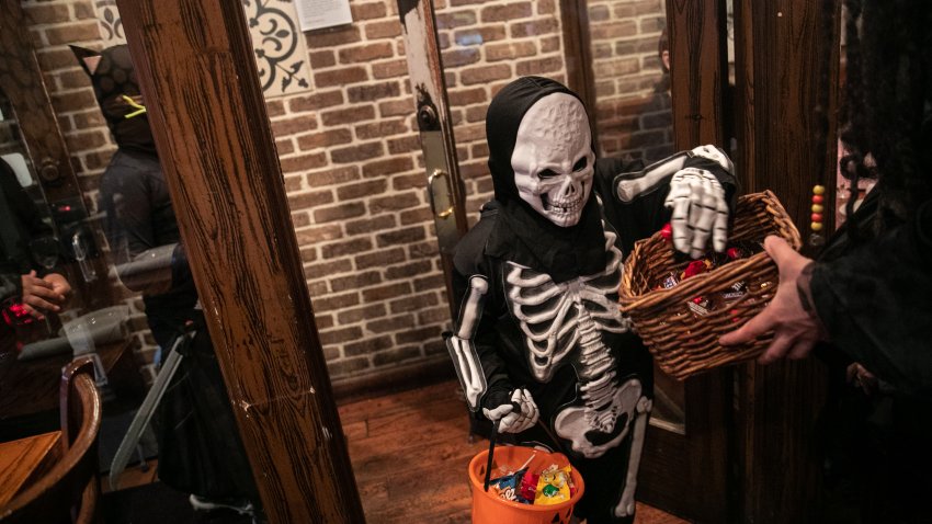 NEW YORK, NY – OCTOBER 31: Children go trick-or-treat at a restaurant on Halloween, October 31, 2019 in New York City. Halloween, which is named from “All Hallows’ Eve”, falls a day before All Saints’ Day on November 1. (Photo by Jeenah Moon/Getty Images)