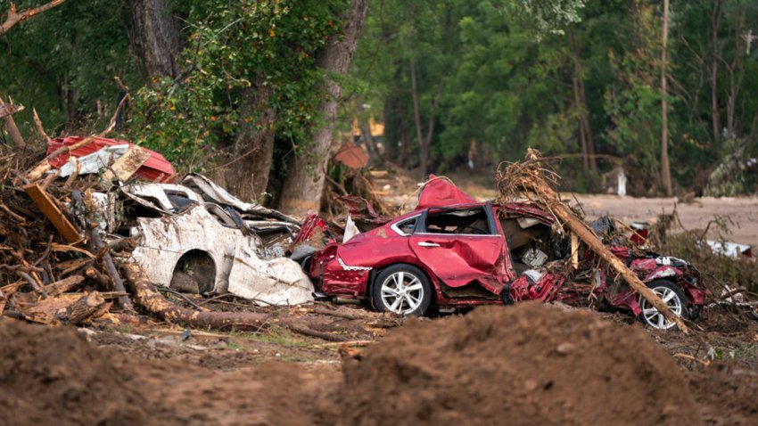 OLD FORT, NORTH CAROLINA – SEPTEMBER 30: Storm damaged cars sit along Mill Creek in the aftermath of Hurricane Helene on September 30, 2024 in Old Fort, North Carolina. According to reports, at least 90 people have been killed across the southeastern U.S., and millions are without power due to the storm, which made landfall as a Category 4 hurricane on Thursday. The White House has approved disaster declarations in North Carolina, Florida, South Carolina, Tennessee, Georgia, Virginia and Alabama, freeing up federal emergency management money and resources for those states. (Photo by Sean Rayford/Getty Images)