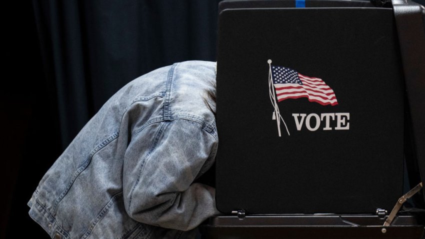 COLUMBUS, OHIO – NOVEMBER 8: People vote at a polling location at Indianola Church of Christ on Election Day on November 8, 2022 in Columbus, Ohio. Republican candidate for U.S. Senate JD Vance and Democratic candidate for U.S. Senate Rep. Tim Ryan (D-OH) are running in a tightly contested race. (Photo by Drew Angerer/Getty Images)