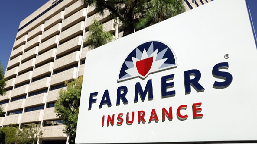 WOODLAND HILLS, CALIFORNIA – AUGUST 29:  The Farmers Insurance logo is displayed outside company headquarters on August 29, 2023 in Woodland Hills, California. The California-based insurer is laying off 2,400 employees, around 11 percent of its workforce, in a restructuring move aimed at increased profitability. The insurance giant announced last month it will no longer offer policies in hurricane-prone Florida and is also not accelerating homeowner policies in California due to wildfire risk and high costs. (Photo by Mario Tama/Getty Images)