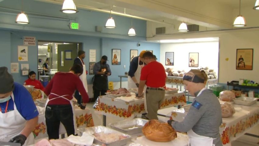 Volunteers prepare Christmas meals at Glide Memorial Church in San Francisco. (Dec. 25, 2024)