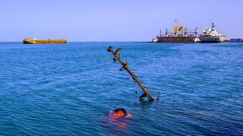 A sunken vessel is pictured at a site hit by Israeli forces in the Huthi-controlled port of Hodeida on the Red Sea on December 21, 2024. Israel has struck multiple targets in Huthi-held areas of Yemen, including ports and energy facilities, in response to a missile fired from Yemen by the Huthis on Tel Aviv before dawn, wounding 16 people in the second such attack in days. (Photo by AFP) (Photo by -/AFP via Getty Images)