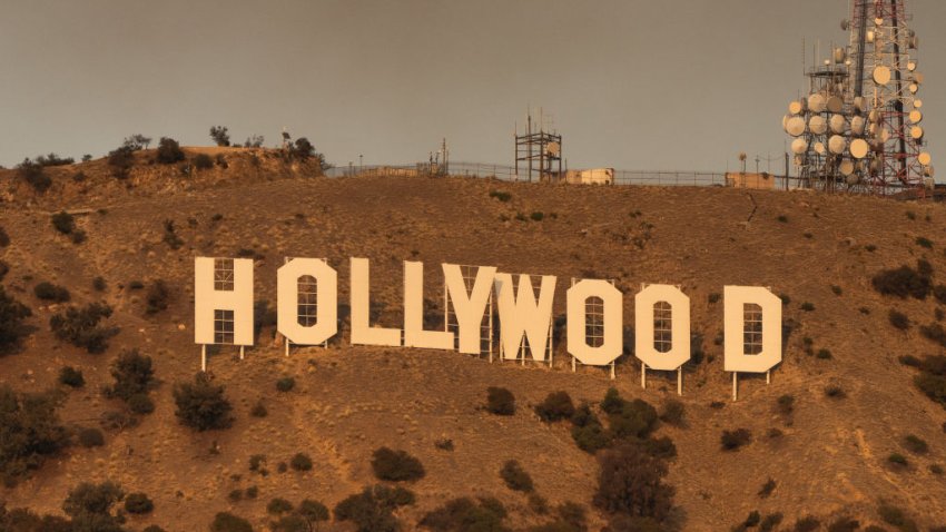 HOLLYWOOD, CA – JANUARY 08: The Hollywood Sign is seen with smoke from multiple wildfires on January 08, 2025 in Hollywood, California.  (Photo by AaronP/Bauer-Griffin/GC Images)