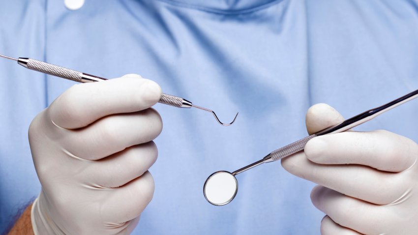 Dentist doing dental