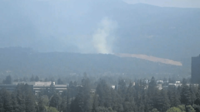 A brush fire burns in South San Jose.