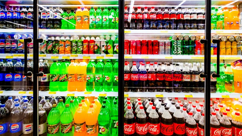 Dubai, UAE – october 16, 2024: various carbonated sugary drinks sold in the supermarket