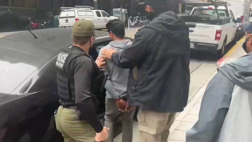 A person is detained by ICE agents at a San Francisco courthouse. (June 10, 2025)