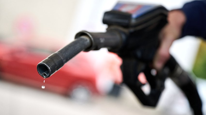 01 October 2026, Bremen: A drop hangs from the gas nozzle. From October 1 through the end of December 2026, the energy tax on gasoline and diesel will be reduced by about 14 cents per liter. According to the federal government, this will result in a total savings of up to 17 cents per liter when VAT is included. Photo: Sina Schuldt/dpa (Photo by Sina Schuldt/picture alliance via Getty Images)